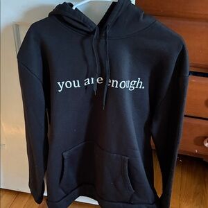 Black You Are Enough Hooded Sweatshirt with motivational saying on  the back